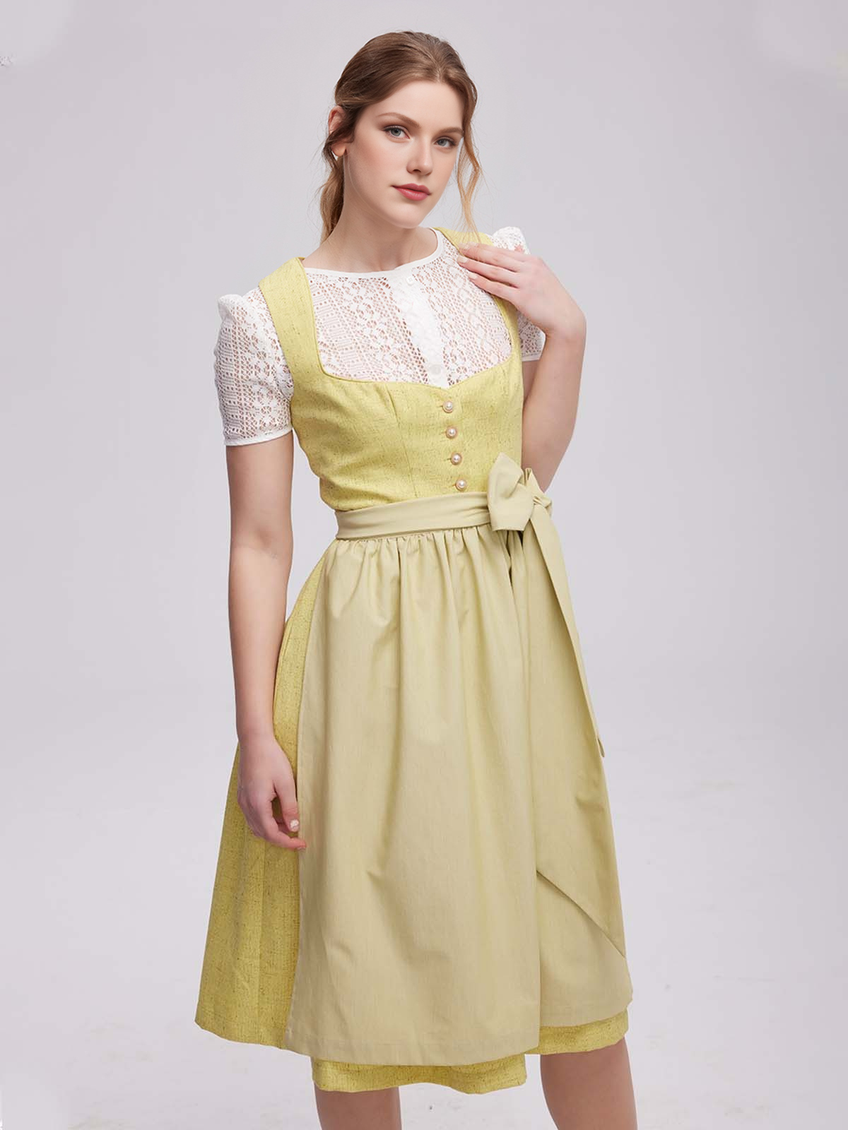 Dirndl in Grau mit gelber Schürze